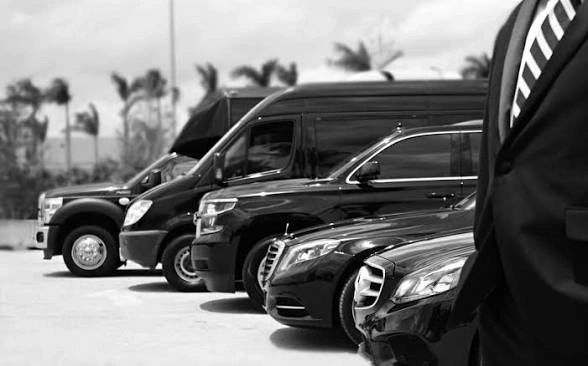 Luxury black vehicle fleet lineup diagonal